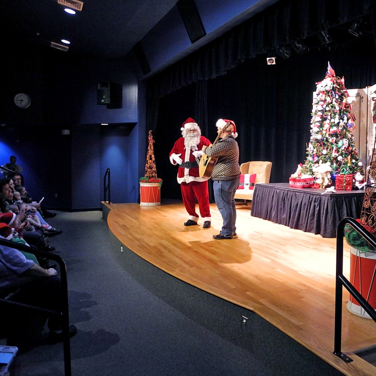 Here’s Wes and Santa in theater during the Member’s Milk and Cookies Party on December 3.